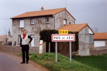 Anabelle Hulaut - Jeu de pas, Bons Baisers On the Road. C-type photograph. 75cm x 110cm. Pas de Jeu, France. 2003.